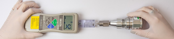 Complex catheter being tested for tensile strength