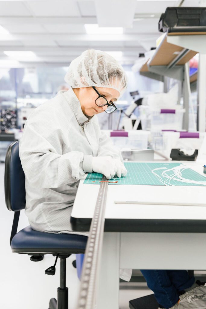 Medical Murray technician creating covered stent